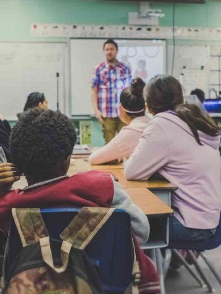 students and teacher in a classroom