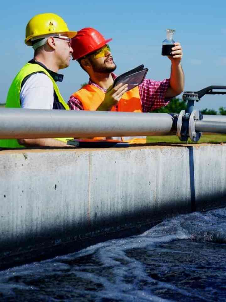 Engineers control water quality in a wastewater treatment plant